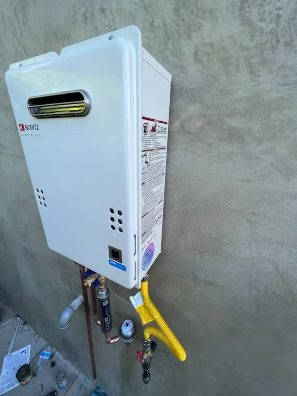 Tankless water heater installation for Mannhurst Oak Manors homes